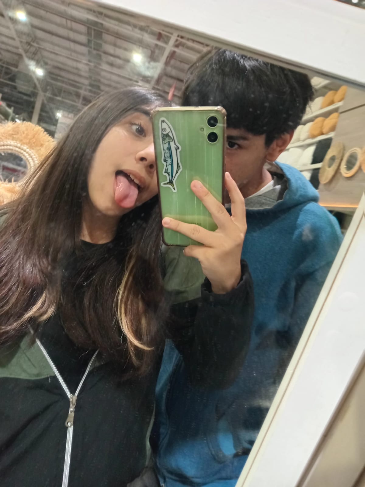 Nosotros dos en un espejo